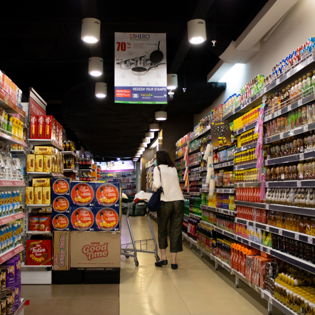 supermarket isle filled with foods 