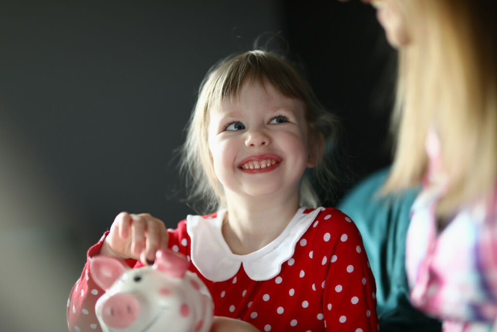 girl with piggy bank